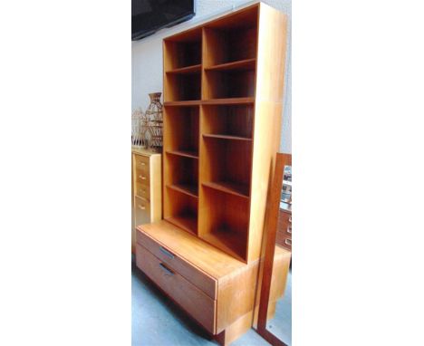 IB KOFOD LARSEN: a Danish modular teak wall unit in three parts: a two drawer chest, 114cm wide 58cm deep 55cm high; and two 