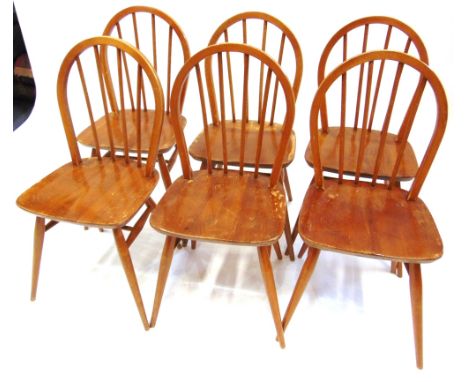 A SET OF SIX ERCOL STICKBACK WINDSOR DINING CHAIRS  on H-shape stretcher bases