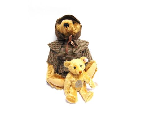 TWO STEIFF COLLECTOR'S TEDDY BEARS  the largest 52cm high and wearing a deerstalker hat and matching coat.