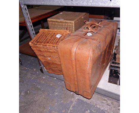 Large leather travelling trunk, a Lloyd Loom laundry basket and a wicker picnic basket (3) 