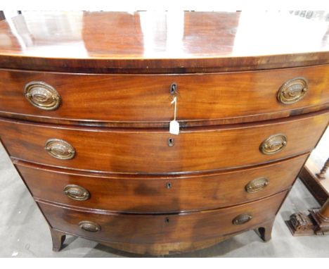 Georgian mahogany and cross-banded bowfront chest of four graduated drawers, shaped apron, splayed bracket feet, oval brass p