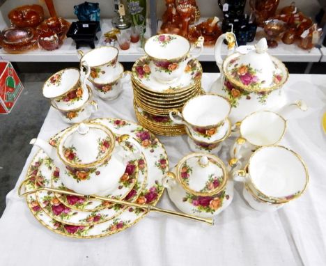 Royal Albert 'Old Country Roses' part tea service comprising graduated pair of teapots, sugar bowl, milk jug, three-tier cake