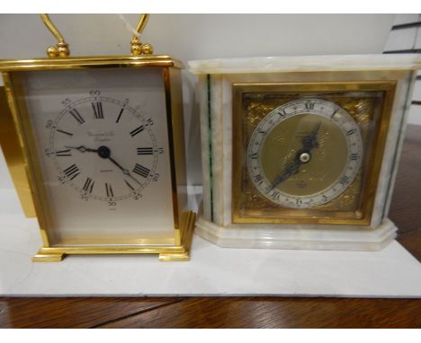 Modern carriage-style timepiece, with battery quartz movement, the dial inscribed 'Garrard and Co, London', and an Elliott ma