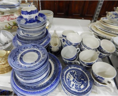 Quantity of Churchill willow pattern blue and white part dinner service including meat plates, bowls, cups, saucers etc., sev