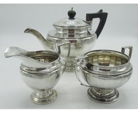 Three piece bachelors silver tea service, comprising teapot, (H14.5cm) milk jug and sugar bowl, hallmarked Birmingham 1919, G