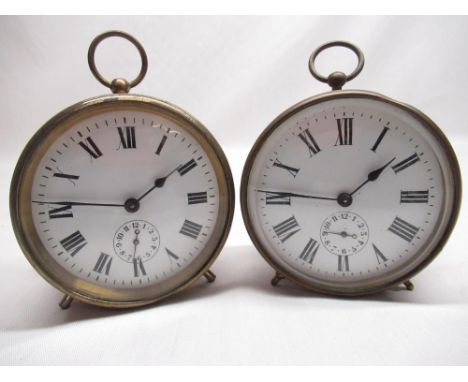 Two R &amp; Co late C19th/early C20th brass drum cased travel alarm clocks with white enamel dials (2) 