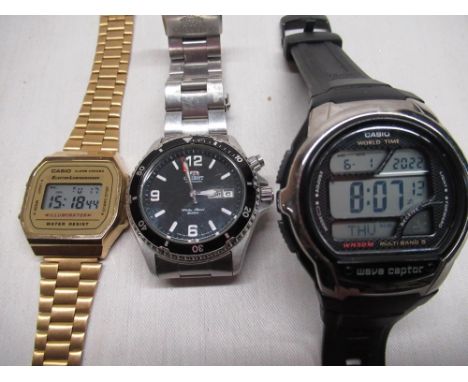 Orient automatic 200m divers watch on stainless steel bracelet, EM55-C0-A, Casio LCD quartz wristwatch in gold case on matchi