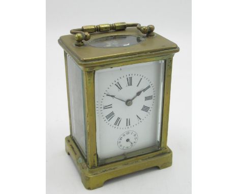 Early C20th French carriage clock alarm with white enamel dial and subsidiary alarm indicator, visible platform lever escapem