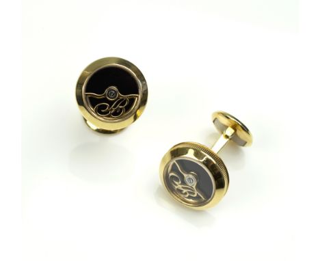 BREGUET ROTOR CUFFLINKS, 18K yellow gold and black enamel with oscillating weight and fluted caseband, signed Breguet and mar