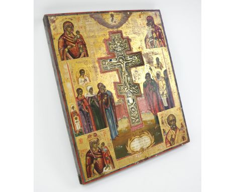 RUSSIAN ICON, painted scenes of the crucifixtion, mother of God and St. Nicholas with a central inset brass cross having trac