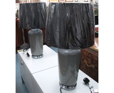 TABLE LAMPS, a pair, ceramic black and white with black shades, Art Deco style, 71cm H. (2)
