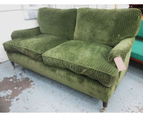GEORGE SMITH SOFA, two seater, with green striped upholstery on short turned front supports with cappings and castors, 185cm 