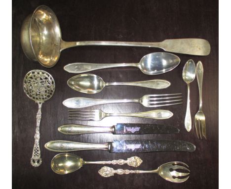 GERMAN SILVER SUITE OF CUTLERY, twelve place setting, plus an associated ladle and three small servers with decorative termin