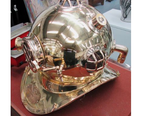 REPRODUCTION DIVER'S HELMET, in metal with a brass effect finish, 37cm H. 