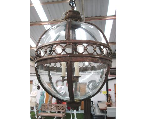 GLOBE HANGING LANTERN, three branches, in a bronze effect frame, 51cm diam, plus chain. 