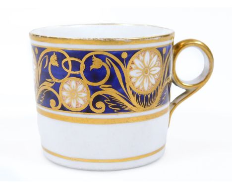 A New Hall porcelain coffee can, c.1800, decorated in blue and gilt with an elaborate pattern of swirls and red swags, patter