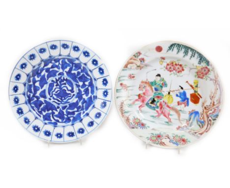 An 18thC Chinese plate, of circular outline, polychrome decorated with figure on horseback before a further figure carrying s