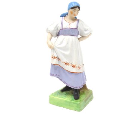 A Russian Gardner porcelain figure, of a lady wearing a turquoise head scarf and purple dress with cream and red pinafore, on