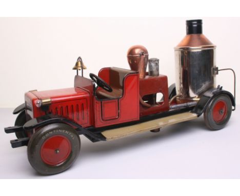 Large scale tinplate c/w Fire Pump with electric light, probably Bing circa 1920, finished in red with open front bench seat,