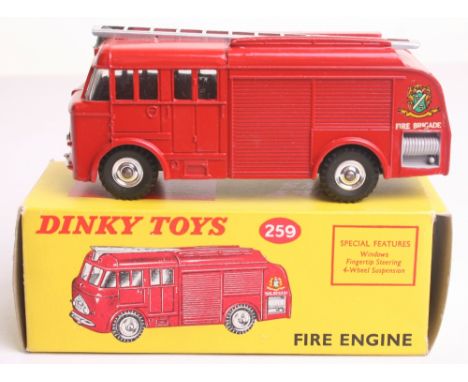 Dinky Toys 259 Fire Engine, red body, spun wheel hubs, silver ladder ‘Fire Brigade’ decals, in near mint boxed condition, box