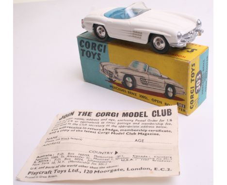 Scarce Corgi Toys 303 Mercedes-Benz 300SL. Open Roadster, white body, blue seats, clear windscreen, scarce shaped spun wheel 