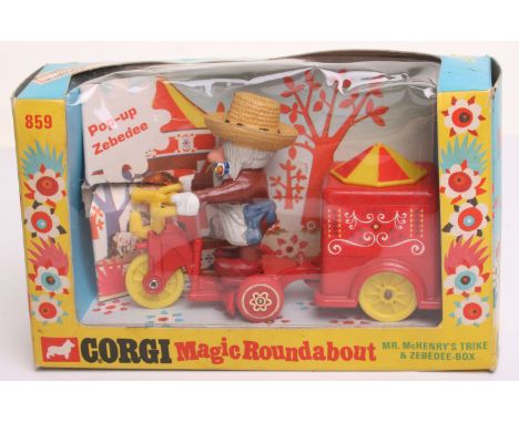 Corgi Toys 859 Magic Roundabout Mr McHenry’s Trike & Zebedee, red/yellow, in mint condition, with blue pull cord still in pac