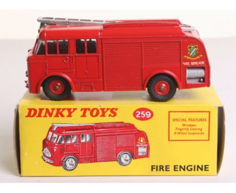 Dinky Toys 259 Fire Engine, red body/plastic wheel hubs, silver ladder, ‘Fire Brigade’ decals, in near mint boxed condition, 