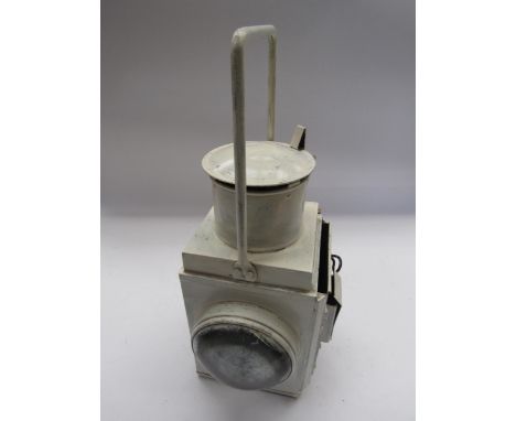 A BR white painted side fitting brake van lamp with twin bulbous lenses, reservoir and brass burner