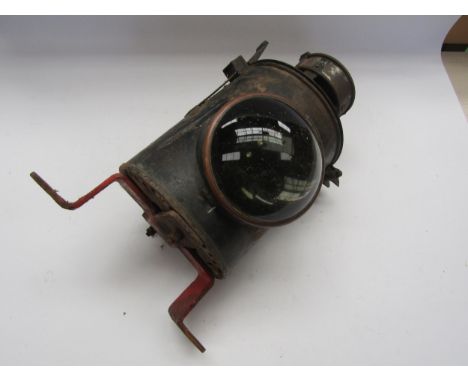 A black painted BR (W) crossing gate lamp case with a BR (W) stamped circular interior copper reservoir and brass burner