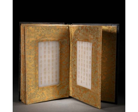 A Chinese Carved Jade AlbumÂ&nbsp; Qing Dynasty Dimensions: Height 9 inches, Width 5 5/8 inches (23 cm x 14.5 cm)