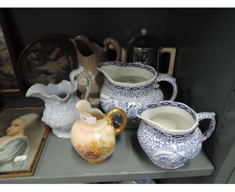 A selection of vintage ceramic jugs including Adams, and Royal Worcester af