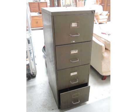A vintage metal filing cabinet