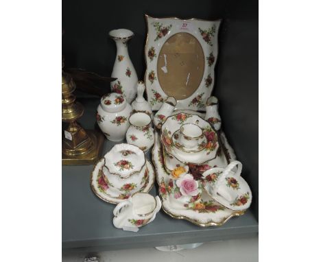 A selection of ceramic trinkets by Royal Albert in the Old Country Roses pattern