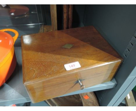 A vintage wooden lockable chest and pair of oak book ends