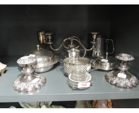 A selection of vintage plated and metal wares including candlesticks
