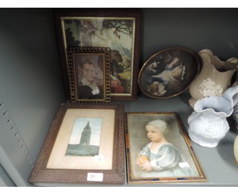 A selection of vintage prints and period frames 