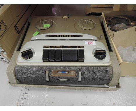 A vintage reel to reel player by Victor
