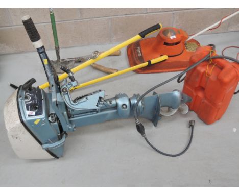 A vintage outboard motor and a plastic fuel tank