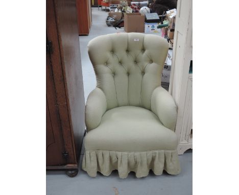 A button back easy chair
