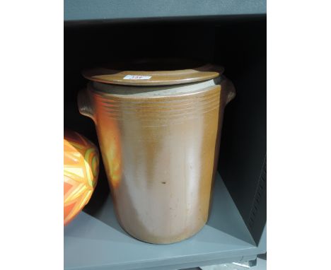 A large earthen ware salt glazed ceramic container with lid and twin handle