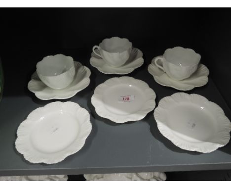 A selection of vintage tea cups and saucers by Coalport with impressed shell design