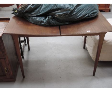 A vintage sapele extending dining table