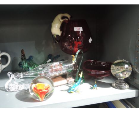 A selection of vintage glass wares including Murano style and paper weights