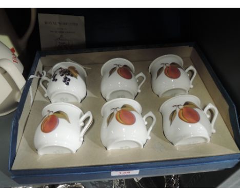 A boxed set of Pot De Creme desert cups by Royal Worcester