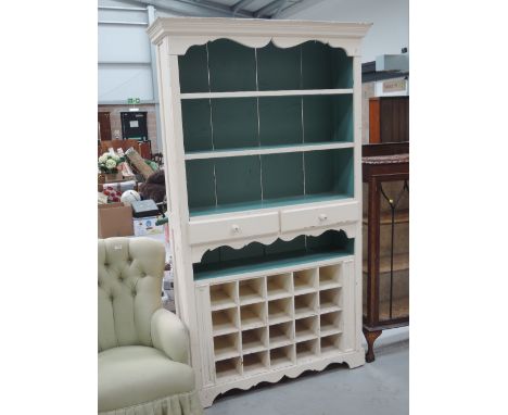 A painted shelf unit, merchants style