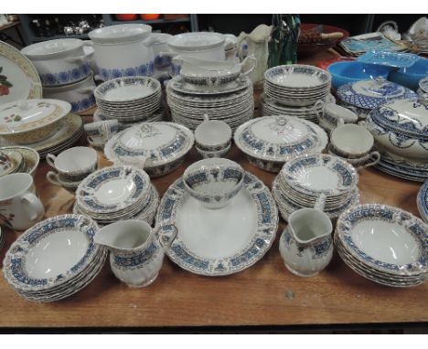 A large part dinner service by Myott fine ironstone ware