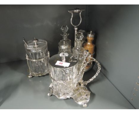 A selection of vintage plated and cut glass sauce servers and cruet set