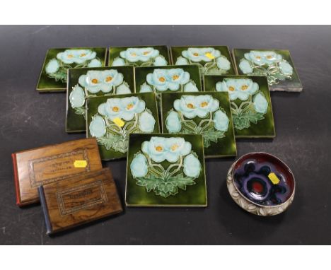 TEN GLAZED WALL TILES WITH FLORAL DECORATION, A POOLE BOWL AND TWO 'JERUSALEM' ALBUMS OF PRESSED FLOWERS IN OLIVE WOOD