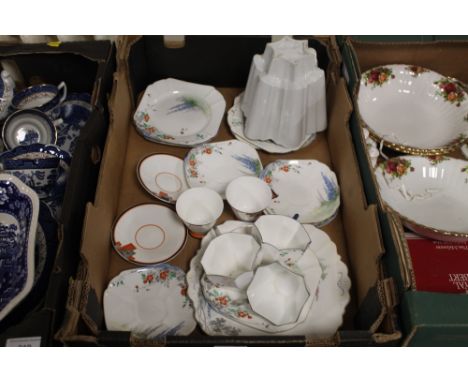 A TRAY OF SHELLEY CHINA TO INCLUDE A CERAMIC JELLY MOULD ETC