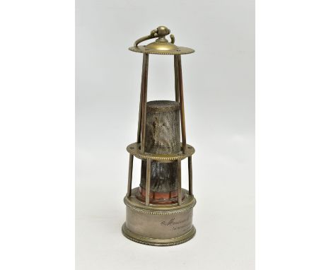 AN EARLY 20TH CENTURY BRASS, COPPER AND PEWTER BELGIAN MINERS LAMP, fitted with a hanging hook, beaded rims, the circular bas